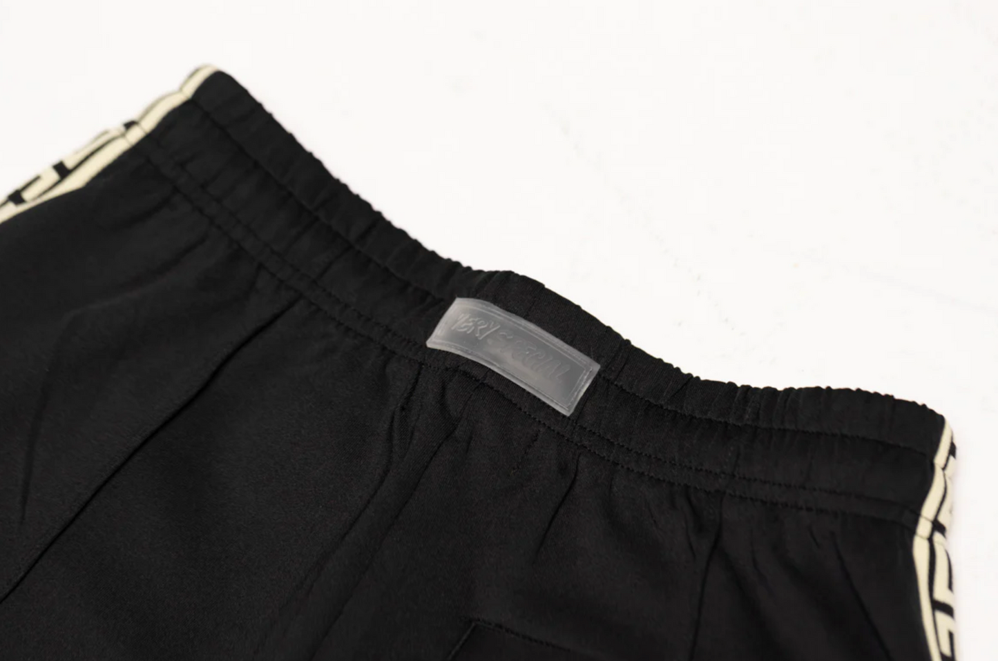 GEO BLACK TRACK PANTS